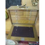 Oak specimen chest with various drawers - (key attached)