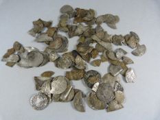 A large quantity of silver hammered coins to (approx. 58g)