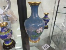 Pair of blue ground Cloisonne vases and a Larger blue Cloisonne vase depicting flowers