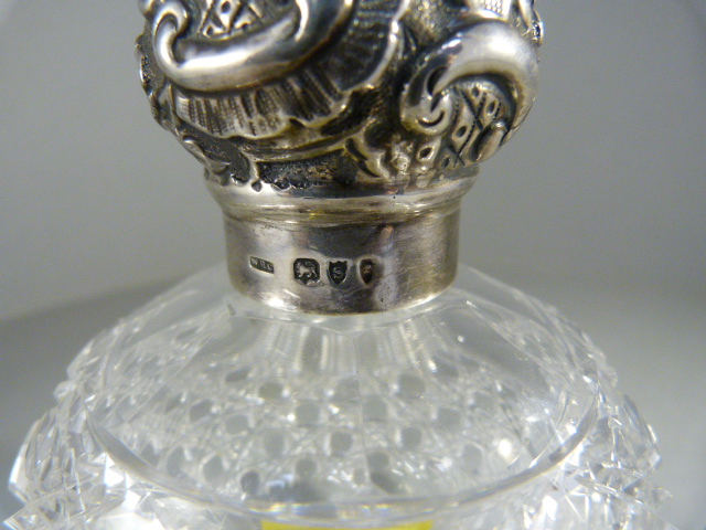 Cut glass scent bottle with original stopper and Hallmarked silver lid - Image 2 of 2