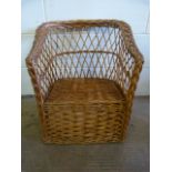 A Childs wicker chair