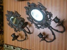 Pair of metal work sconces with candleabras