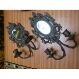 Pair of metal work sconces with candleabras