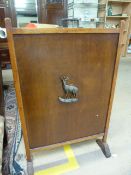 Mahogany fire screen with metal figure of a deer to front