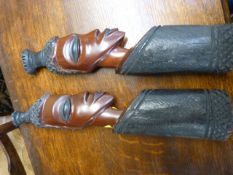 Pair of carved wooden african tribal figures