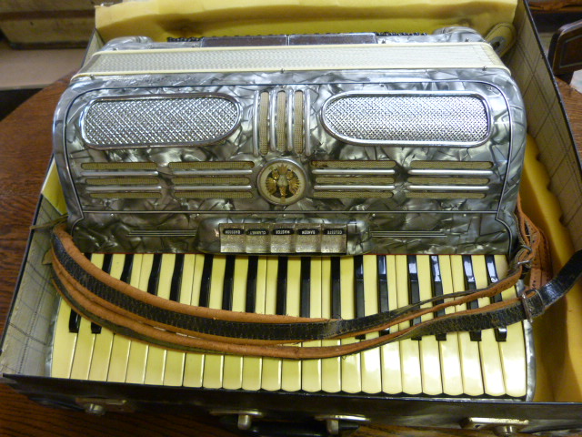 An Italian `Soprani di Silviod Recanati` Piano Accordion, numbered 570 with grey mother of pearl