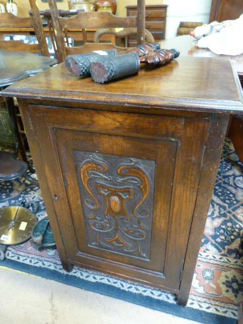 Oak pot cupboard with carving to front panel