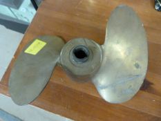 A Columbian brass propeller