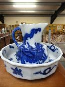 Mason's Blue and White transfer dragon pattern washbowl and matching jug (Jug A/F)
