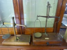 Pair of small wooden based weighing scales