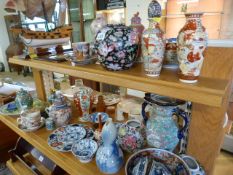 Collection of various chinese and oriental pieces, vases, bowls etc 2 shelves