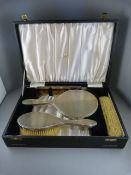 A Boxed Hallmarked Silver backed dressing table set - original box with fold down front.