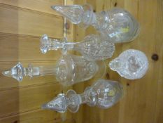 Pair of glass decanters, two others and a perfume bottle