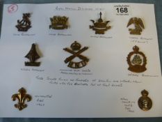 9 various cap badges - to make a up a complete collection of the Royal Naval Division