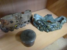 Two oriental storage pots carved from various stone and a small trinket pot