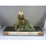 Spelter painted figure on marble plinth depicting a pheasant woman and her dog