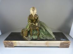Spelter painted figure on marble plinth depicting a pheasant woman and her dog