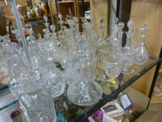 eighteen various decanters all with stoppers