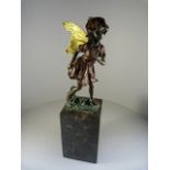 Bronze figure of a garden Fairy on tall marble plinth