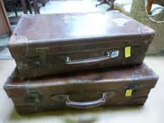 Two vintage leather cases and a wicker basket