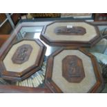 Three carved wall plaques -