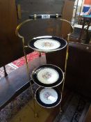 Art Nouveau plate stand with three Royal Harvey Staffordshire plates