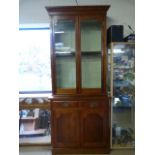 A Small mahogany dresser with glass cabinet over