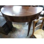 A Mahogany half moon card table