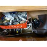 Box containing various fishing gear - reels and weights etc