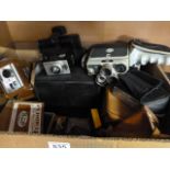 Box containing large quantity of vintage cameras