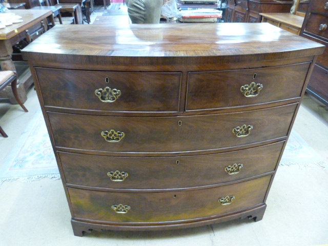 Flamed mahogany Bow fronted chest of drawers