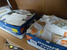 Two boxes containing various loose stamps etc