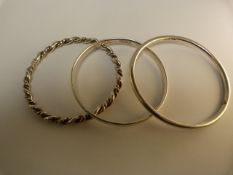 Three Hallmarked silver bangles - 74.2g