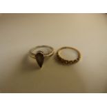 Two dress rings 9ct white gold (A/F stone) - Yellow Gold seven stone half hoop eternity ring Size