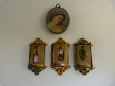 Three Lozenge hand painted porcelain miniatures along with one other handpainted miniature mounted