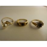 Three various gold rings