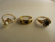 Three various gold rings