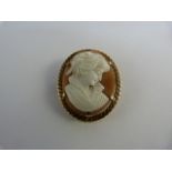 1970's 9ct Gold cameo brooch of a lady approx 29mm x 23.5mm across