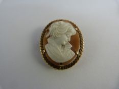 1970's 9ct Gold cameo brooch of a lady approx 29mm x 23.5mm across