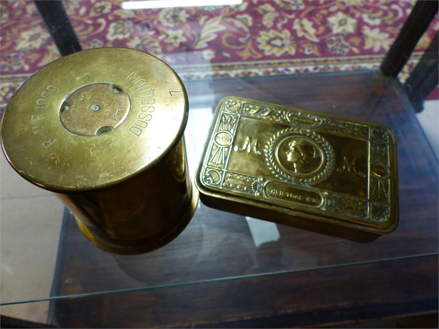 Trench art gun shell case marked RhMF 1911 Dusseldorf to one end and RhMF 1909 Dusseldorf to the