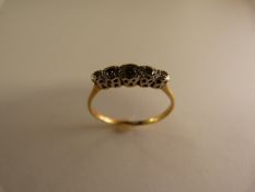 18ct Gold diamond ring with 5 diamonds set in platinum
