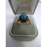 Vintage 1980's 9ct Yellow Gold Sapphire and Turquoise cluster ring - The centre oval cabachon