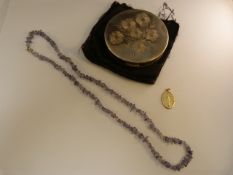 Silver 1981 engraved powder compact, Catholic medallion and an Amethyst chip necklace with