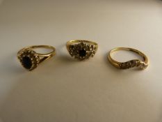 Three 9ct yellow gold CZ set ring Size J - L Total weight 5.9g