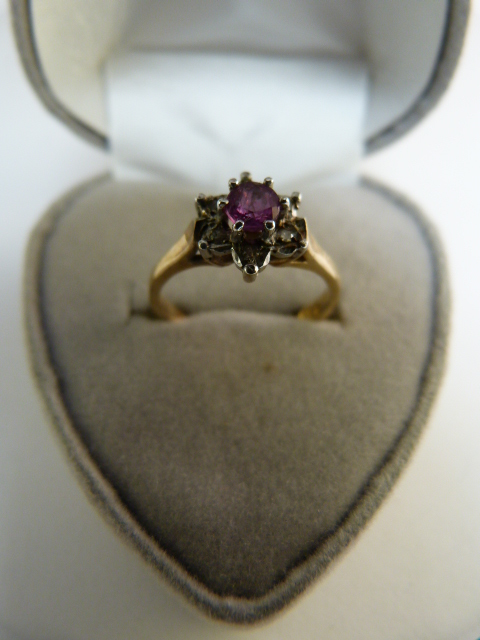 Ruby and Diamond cluster ring in 9ct Gold