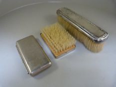 Hallmarked silver clothes brush, silverplated small box and one other brush