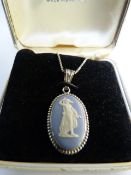 1940's Wedgwood Jasperware pendant depicting a classical scene of a lady with serpent (hung on a