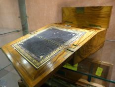 Walnut writing slope - brass plaque to front unmarked. Two fold slope with black leather and gilt