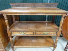 Oak Victorian three tiered Dumbwaiter on castors. Some repair work to legs at back. Two drawers