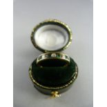 18ct Yellow Gold ring set with four emeralds and three diamonds Gross weight 2.6g